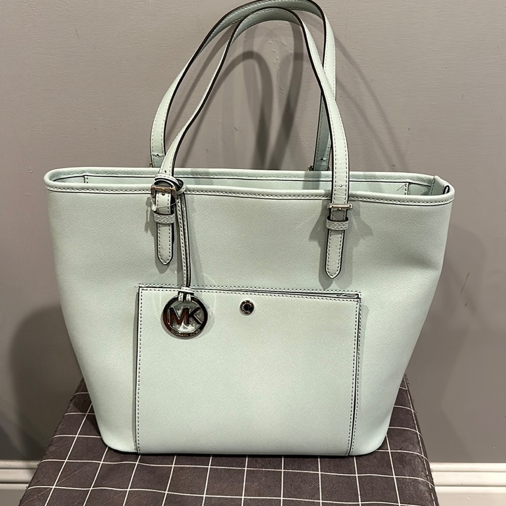 Large size tote bag.  Multiple compartments.  Mint green.  Excellent condition.